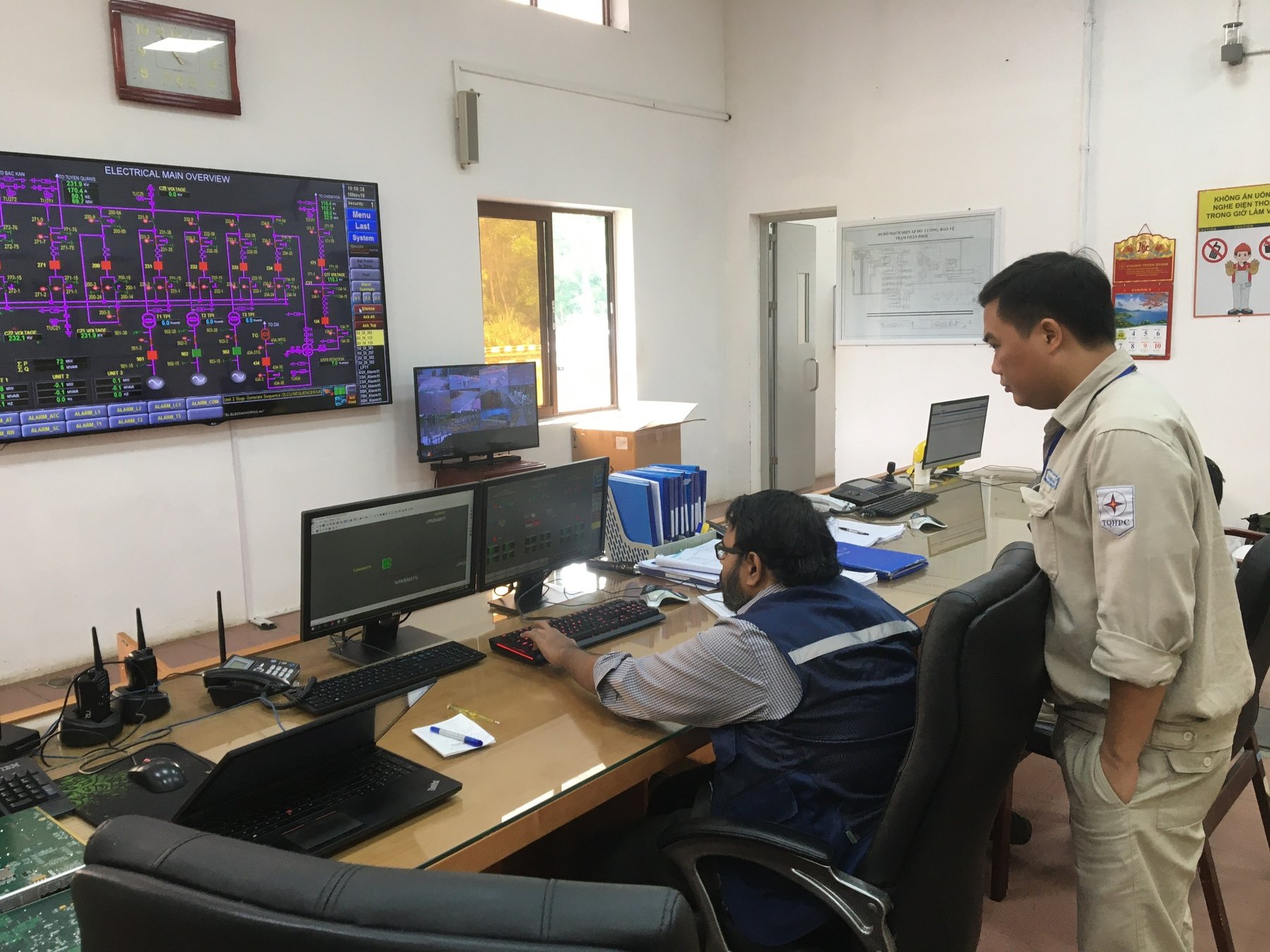 IronPeak automation team in a power plant control room