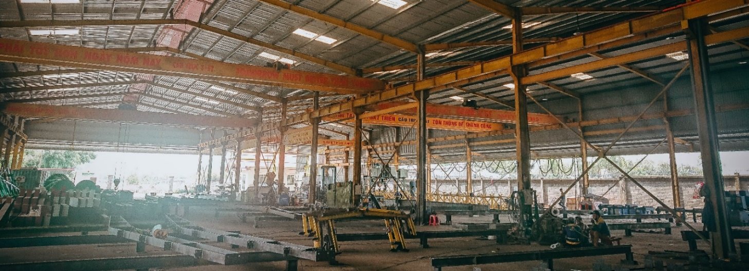 IronPeak steel fabrication warehouse with overhead crane and beams